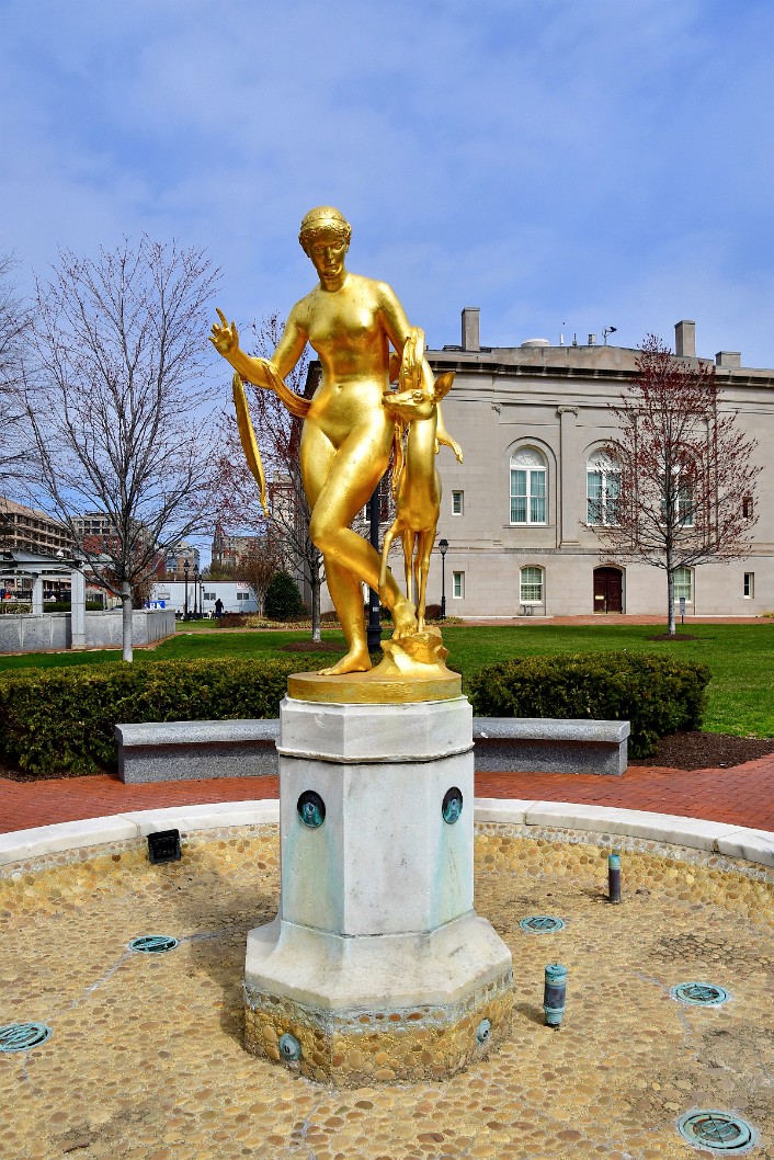 Golden Statue and Dry Fountain